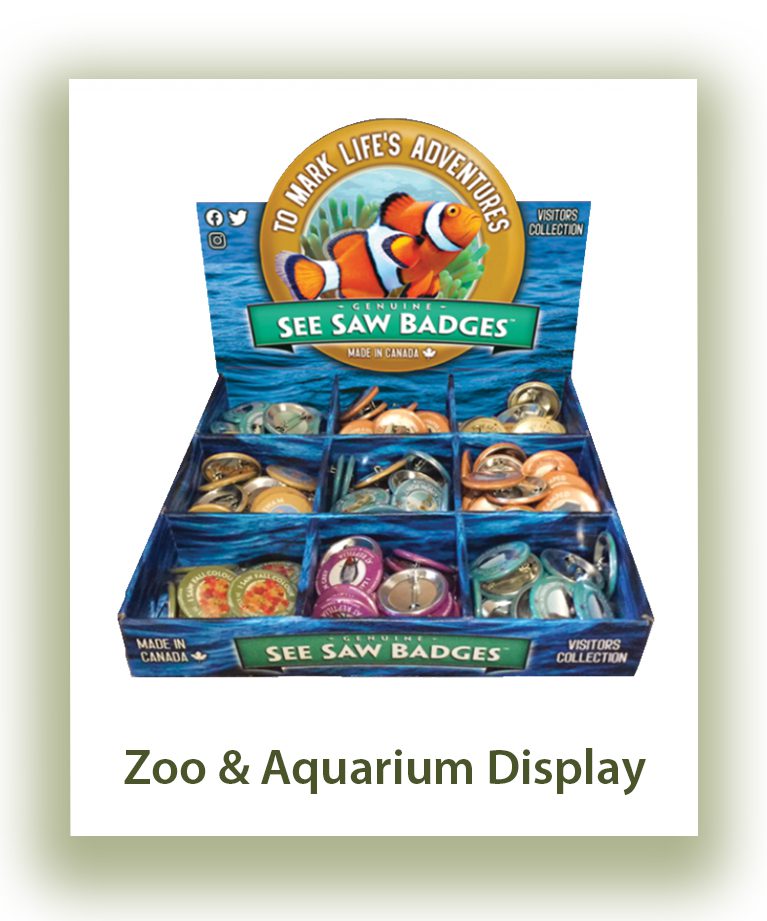 Display box of Sea Saw Badges featuring zoo and aquarium animals.